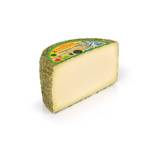 Aged Sheep's Cheese covered with Oregano and Raw Milk Honey