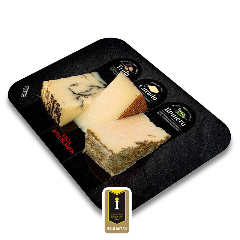 Board with wedges of Black Truffle, Cured Meat and Rosemary